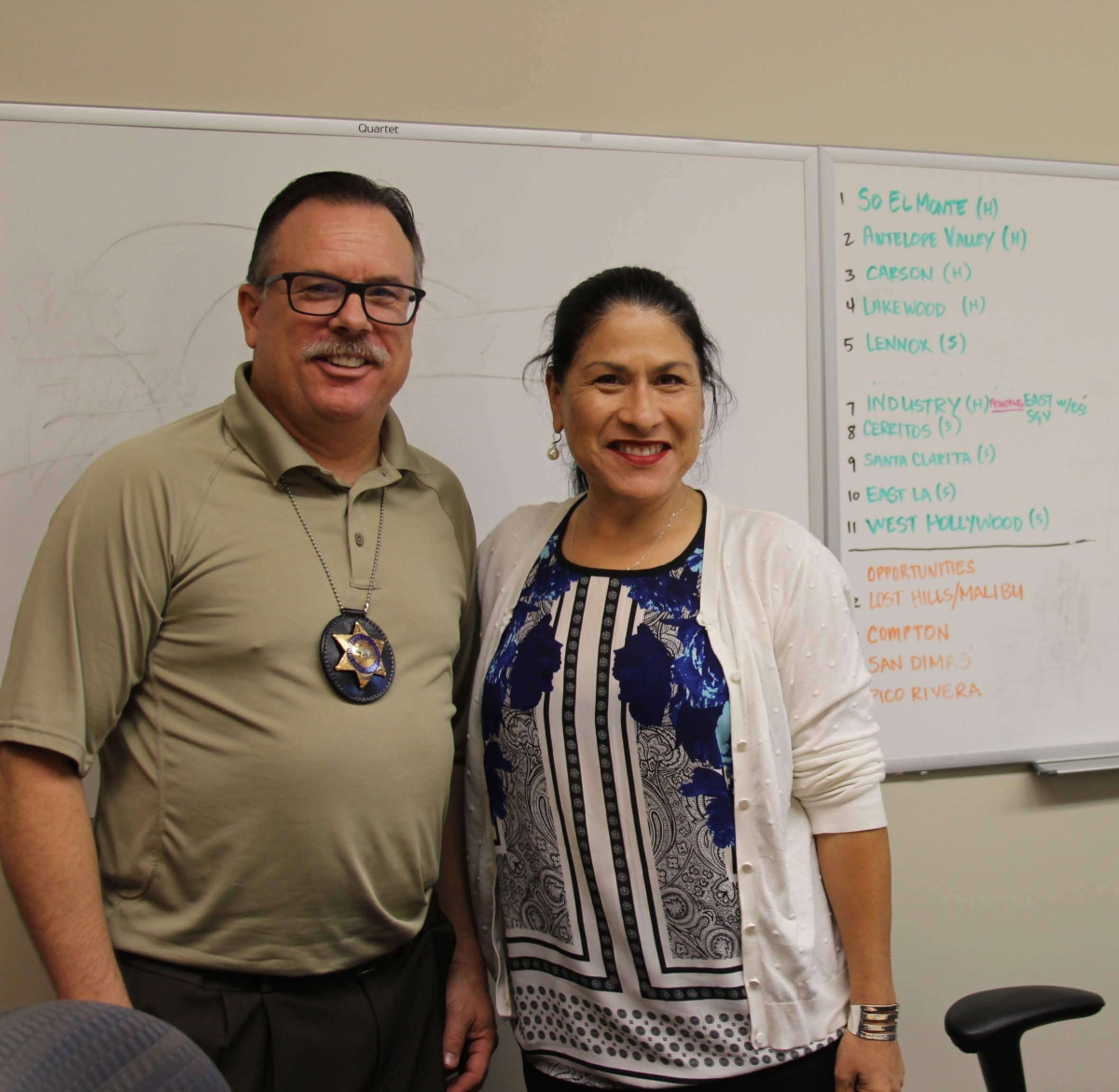 Lieutenant John Gannon of the Sheriff’s MET Team meets with 211 LA Executive Director, Maribel Marin, before the ride-along.